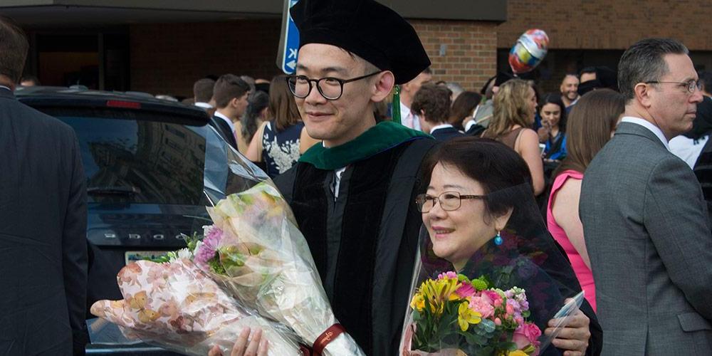 2018 Graduate with his mother